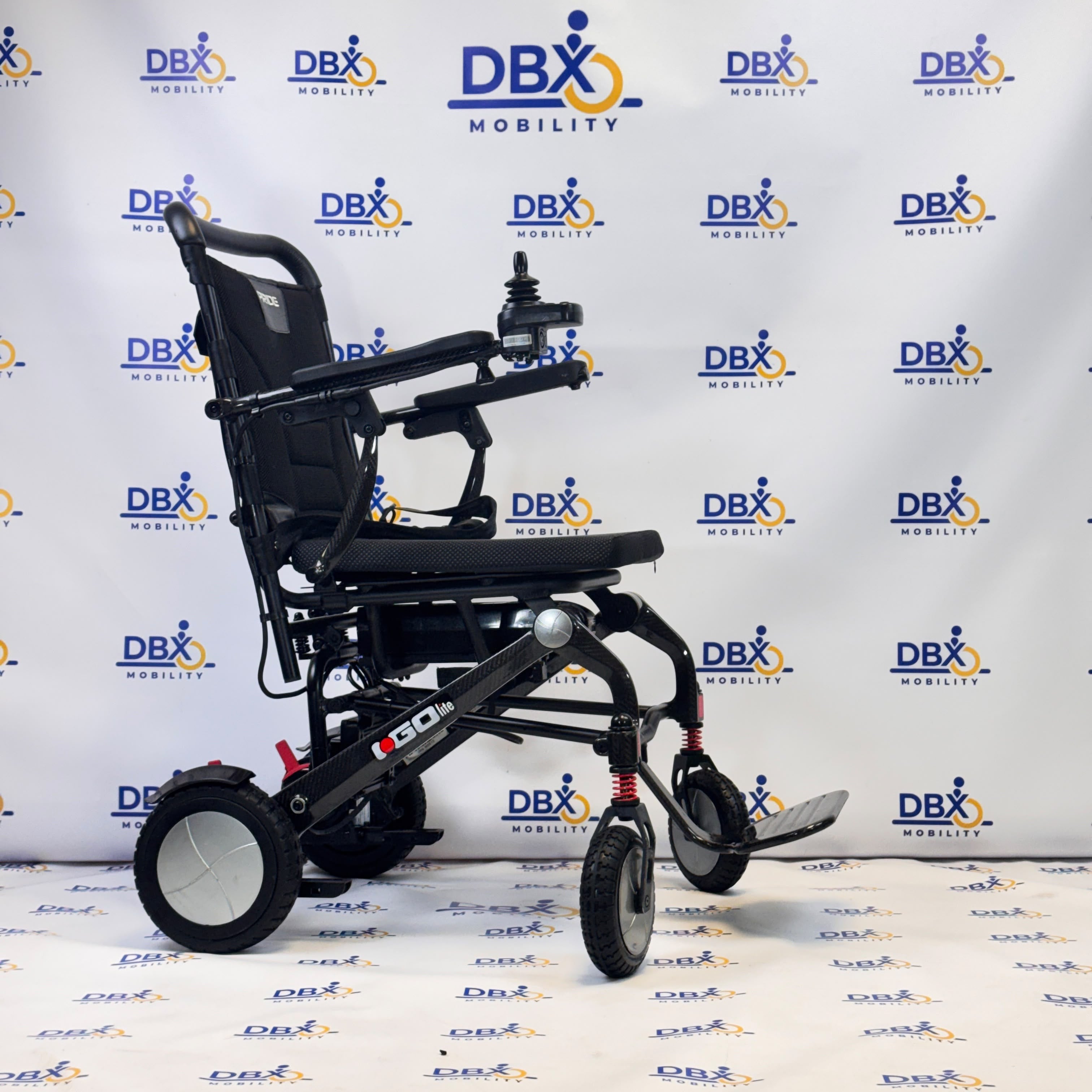 Pride iGo Lite Carbon Refurbished Folding Powerchair | DBX Mobility