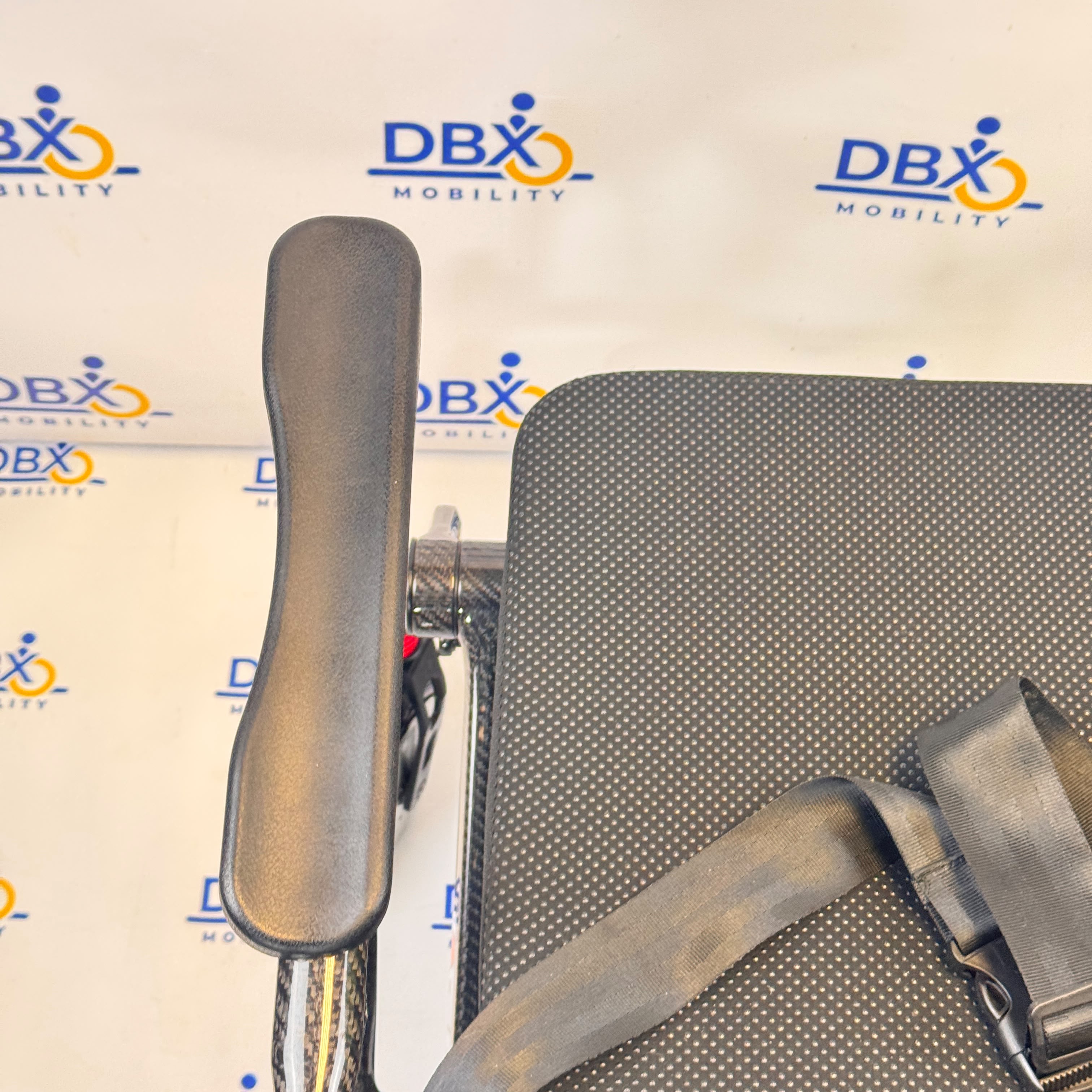 Pride iGo Lite Carbon Refurbished Folding Powerchair | DBX Mobility