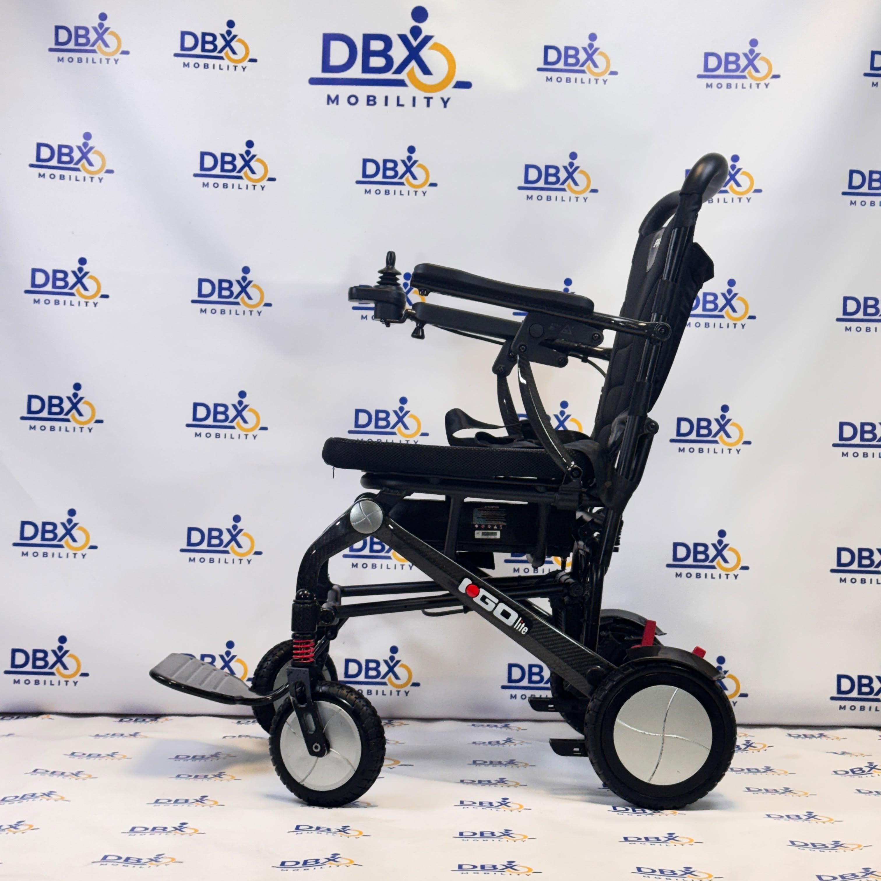 Pride iGo Lite Carbon Refurbished Folding Powerchair | DBX Mobility