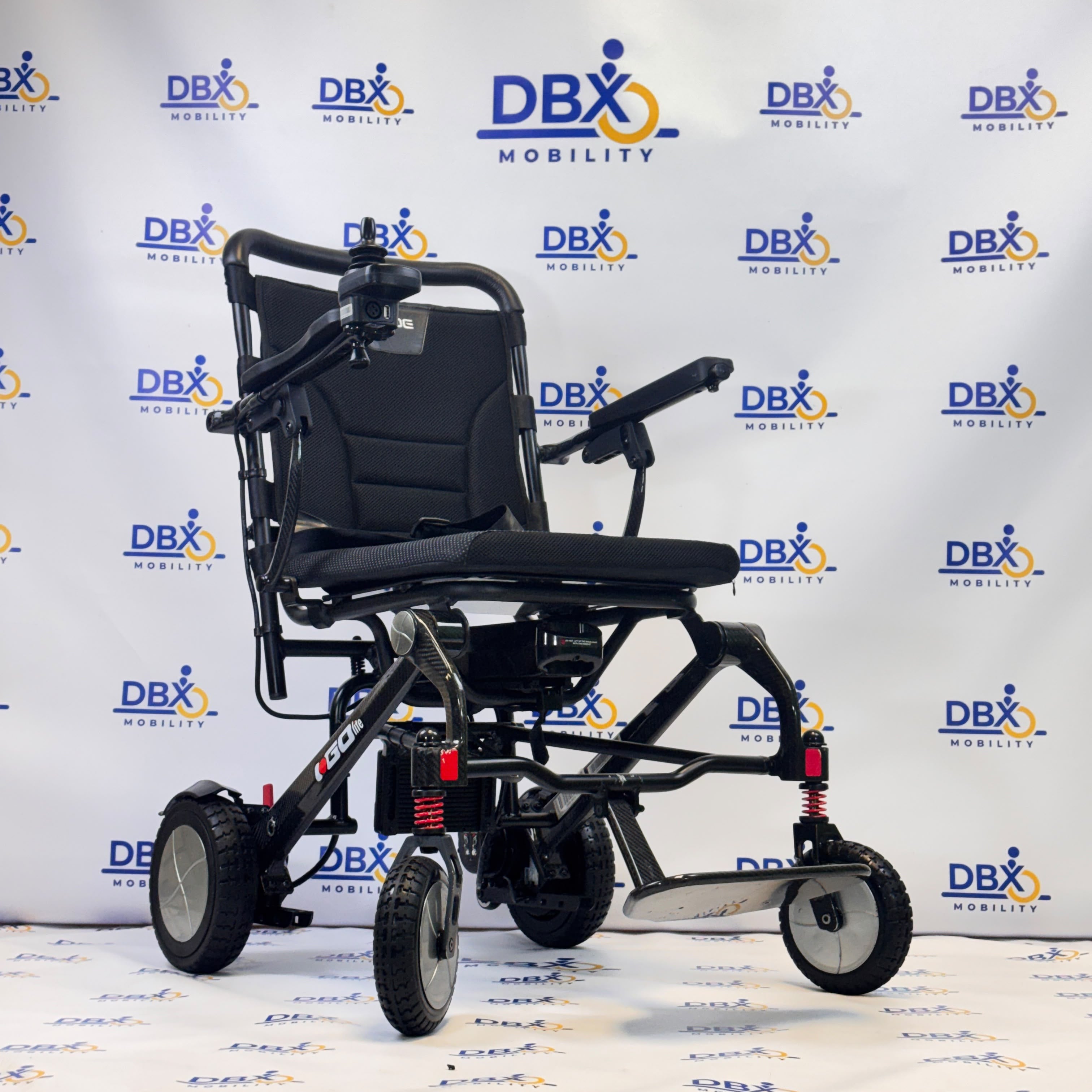 Pride iGo Lite Carbon Refurbished Folding Powerchair | DBX Mobility